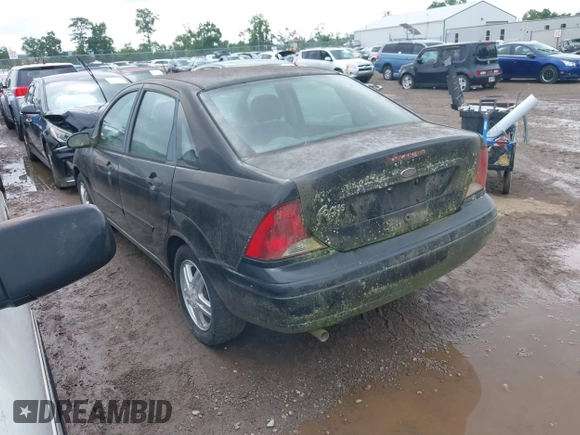 2004 Ford Focus SE with VIN 1FAFP34394W114485, listed as a IAAI auction lot 42737378 with 104,817 mi miles and . Bid and sale history available at DreamBid. Image 3.