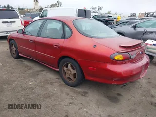 1997 Ford Taurus z VIN 1FALP54N7VA137035, wystawiony jako IAAI lot #41778551 z przebiegiem 137 025 mil mil oraz . Historia ofert i sprzedaży dostępna na DreamBid. Obrazek 3.