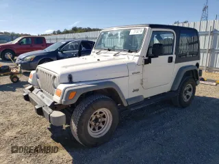 2006 Jeep Wrangler Sport Right Hand Drive with VIN 1J4F449S76P747454, listed as a Copart auction lot 77819214 with 184,763 mi miles and Salvage Title. Bid and sale history available at carsss.com. Image 1.
