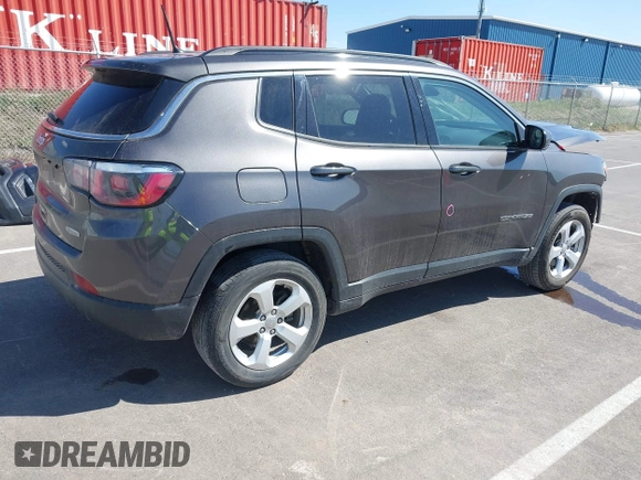 2018 Jeep Compass Altitude with VIN 3C4NJDBB3JT316425, listed as a IAAI auction lot 41923797 with 96,969 mi miles and . Bid and sale history available at carsss.com. Image 4.