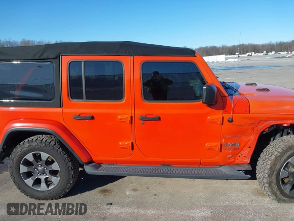 2018 Jeep Wrangler Unlimited Sahara with VIN 1C4HJXEN1JW198258, listed as a IAAI auction lot 41440346 with 44,469 mi miles and . Bid and sale history available at DreamBid. Image 14.