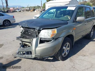 2007 Honda Pilot EX-L with VIN 5FNYF28727B041336, listed as a IAAI auction lot 41926326 with 102,927 mi miles. Bid and sale history available at carsss.com. Image 12.