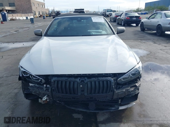 2022 BMW 4 Series M440i with VIN WBA53AT02NCJ20674, listed as a IAAI auction lot 41200398 with 28,235 mi miles and . Bid and sale history available at DreamBid. Image 13.