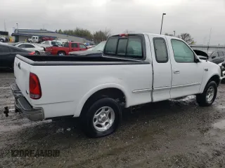 1997 Ford F-150 with VIN 2FTEX18L6VCA28603, listed as a Copart auction lot 49100835 with 127,510 mi miles and Salvage title. Bid and sale history available at DreamBid. Image 3.
