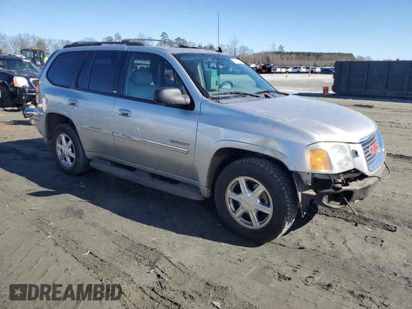 2006 GMC Envoy SLT with VIN 1GKDS13S362362176, listed as a Copart auction lot 43038795 with 180,279 mi miles and Salvage Title. Bid and sale history available at carsss.com. Image 4.