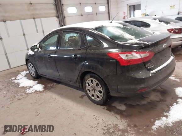 2012 Ford Focus SE with VIN 1FAHP3F2XCL414212, listed as a IAAI auction lot 41472826 with 162,025 mi miles. Bid and sale history available at carsss.com. Image 3.