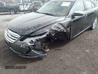 2010 Ford Taurus Limited with VIN 1FAHP2FWXAG153781, listed as a IAAI auction lot 41833315 with 176,800 mi miles. Bid and sale history available at carsss.com. Image 6.
