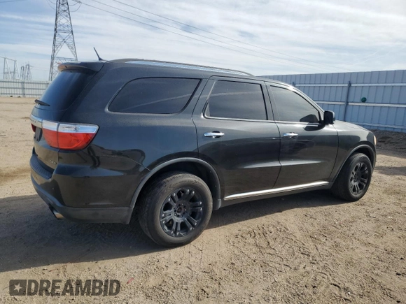 2013 Dodge Durango Crew z VIN 1C4SDJDT2DC637855, wystawiony jako Copart lot #52142195 z przebiegiem 183 244 mil mil oraz Czysty tytuł • Clean title. Historia ofert i sprzedaży dostępna na DreamBid. Obrazek 3.