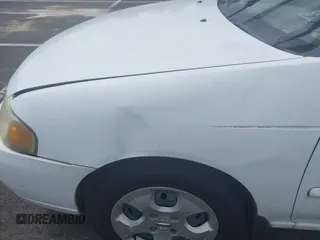 2003 Nissan Sentra XE z VIN 3N1CB51D33L776980, wystawiony jako IAAI lot #42451100 z przebiegiem 234 099 mil mil oraz . Historia ofert i sprzedaży dostępna na DreamBid. Obrazek 6.