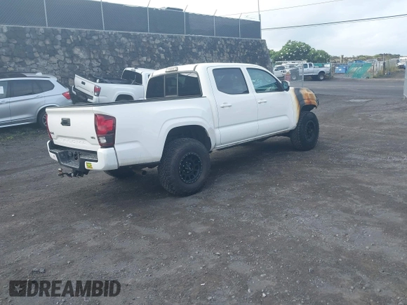 2023 Toyota Tacoma SR with VIN 3TYCZ5AN4PT168312, listed as a IAAI auction lot 42555775 with 8,288 mi miles and . Bid and sale history available at DreamBid. Image 4.