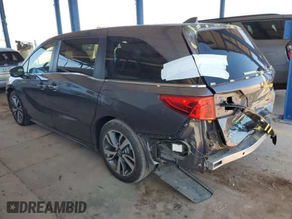 2021 Honda Odyssey Touring with VIN 5FNRL6H88MB040703, listed as a Copart auction lot 60340095 with 66,171 mi miles and Salvage title. Bid and sale history available at DreamBid. Image 2.