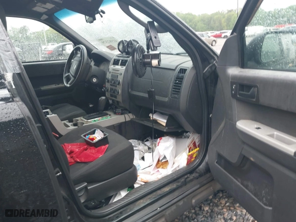 2010 Ford Escape XLT with VIN 1FMCU0DG2AKB66255, listed as a IAAI auction lot 41982329 with 192,564 mi miles. Bid and sale history available at carsss.com. Image 5.