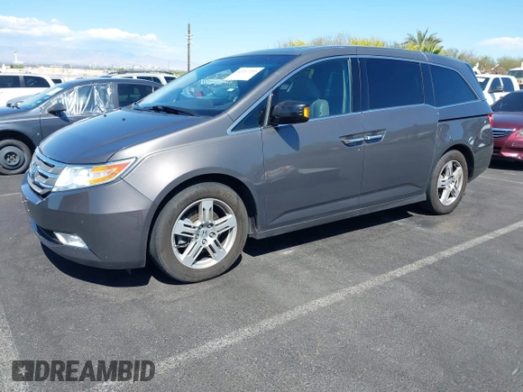 2013 Honda Odyssey Touring with VIN 5FNRL5H95DB045666, listed as a IAAI auction lot 42117219 with 50,715 mi miles and . Bid and sale history available at carsss.com. Image 17.