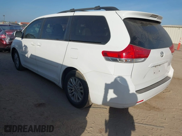 2011 Toyota Sienna XLE AAS with VIN 5TDYK3DC3BS146461, listed as a IAAI auction lot 41829779 with 183,027 mi miles. Bid and sale history available at carsss.com. Image 3.