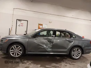 2018 Volkswagen Passat SE z VIN 1VWBA7A36JC009970, wystawiony jako IAAI lot #42179127 z przebiegiem 86 612 mil mil oraz . Historia ofert i sprzedaży dostępna na DreamBid. Obrazek 6.