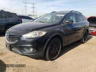 2015 Mazda CX-9 Grand Touring z VIN JM3TB3DA7F0455925, wystawiony jako Copart lot #56603325 z przebiegiem 119 285 mil mil oraz Czysty tytuł • Clean title. Historia ofert i sprzedaży dostępna na DreamBid. Obrazek 1.