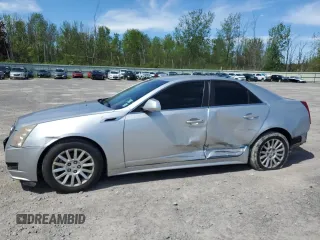 2012 Cadillac CTS z VIN 1G6DC5E54C0153434, wystawiony jako Copart lot #57893265 z przebiegiem 196 678 mil mil oraz Czysty tytuł • Clean title. Historia ofert i sprzedaży dostępna na DreamBid. Obrazek 1.