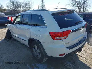 2012 Jeep Grand Cherokee Laredo with VIN 1C4RJFAGXCC224138, listed as a IAAI auction lot 41736375 with 133,383 mi miles. Bid and sale history available at carsss.com. Image 3.