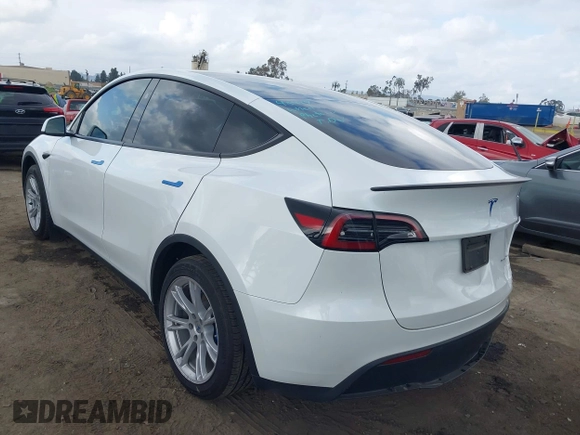 2024 Tesla Model Y Long Range with VIN 7SAYGDEE5RF036018, listed as a IAAI auction lot 42120803 with 25,347 mi miles. Bid and sale history available at carsss.com. Image 3.