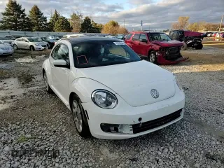 2012 Volkswagen Beetle 2.5L PZEV with VIN 3VWJP7AT3CM610930, listed as a Copart auction lot 79702664 with 0 mi miles and Salvage Title. Bid and sale history available at carsss.com. Image 10.