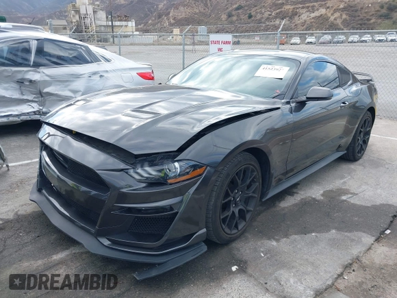 2018 Ford Mustang EcoBoost z VIN 1FA6P8THXJ5154523, wystawiony jako IAAI lot #41523923 z przebiegiem 94 330 mil mil oraz . Historia ofert i sprzedaży dostępna na DreamBid. Obrazek 2.