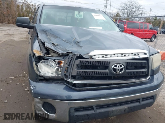 2010 Toyota Tundra with VIN 5TFUM5F16AX005232, listed as a IAAI auction lot 41688311 with 251,296 mi miles and . Bid and sale history available at DreamBid. Image 6.