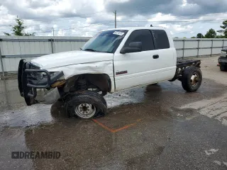 2000 Dodge 2500 with VIN 3B7KF2363YG114309, listed as a Copart auction lot 60270975 with 214,660 mi miles and Salvage title. Bid and sale history available at DreamBid. Image 1.