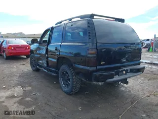 2001 Chevrolet Tahoe LS with VIN 1GNEK13T41R219642, listed as a IAAI auction lot 41655081 with 243,737 mi miles. Bid and sale history available at carsss.com. Image 3.