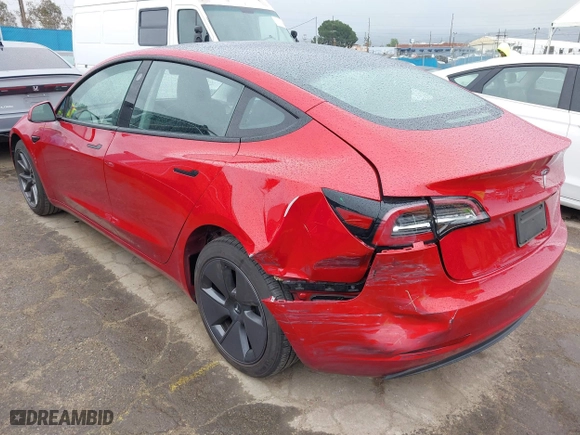 2023 Tesla Model 3 with VIN 5YJ3E1EA2PF476140, listed as a IAAI auction lot 41789189 with 33,435 mi miles. Bid and sale history available at carsss.com. Image 3.