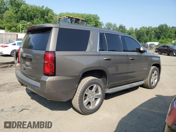2016 Chevrolet Tahoe LT with VIN 1GNSCBKCXGR241872, listed as a Copart auction lot 59628315 with 156,862 mi miles and Salvage title. Bid and sale history available at DreamBid. Image 3.