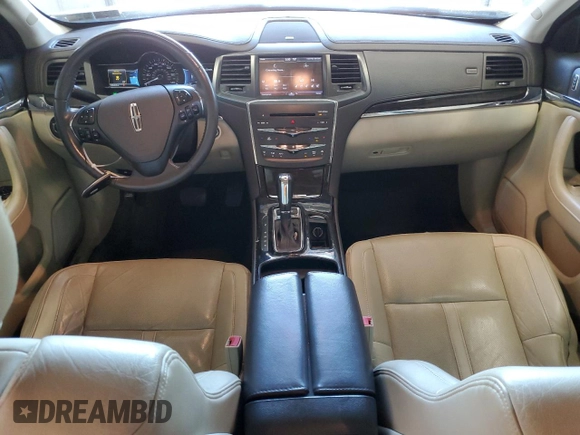 2013 Lincoln MKS EcoBoost with VIN 1LNHL9FT2DG604657, listed as a Copart auction lot 65357735 with 133,548 mi miles and Salvage title. Bid and sale history available at DreamBid. Image 8.