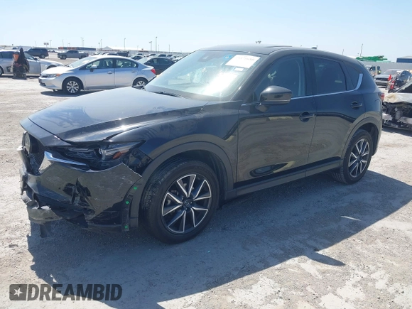 2018 Mazda CX-5 Grand Touring with VIN JM3KFADM8J0330035, listed as a IAAI auction lot 41878680 with 62,632 mi miles. Bid and sale history available at carsss.com. Image 18.