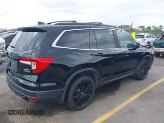 2021 Honda Pilot Special Edition z VIN 5FNYF6H22MB070469, wystawiony jako IAAI lot #41924528 z przebiegiem 56 589 mil mil oraz . Historia ofert i sprzedaży dostępna na DreamBid. Obrazek 4.