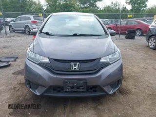 2015 Honda Fit LX with VIN 3HGGK5H58FM722880, listed as a IAAI auction lot 42276261 with 104,886 mi miles and . Bid and sale history available at DreamBid. Image 12.