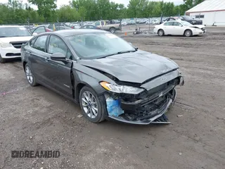 2017 Ford Fusion Hybrid SE with VIN 3FA6P0LU0HR285451, listed as a IAAI auction lot 42312990 with 78,880 mi miles and . Bid and sale history available at DreamBid. Image 1.