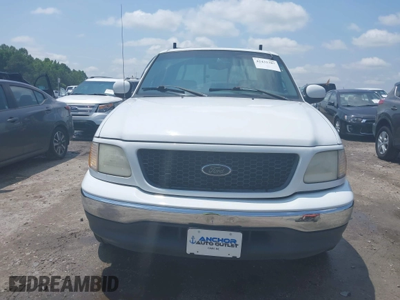 2001 Ford F-150 XLT with VIN 1FTRW07L91KB77612, listed as a IAAI auction lot 42432387 with 106,574 mi miles and . Bid and sale history available at DreamBid. Image 12.