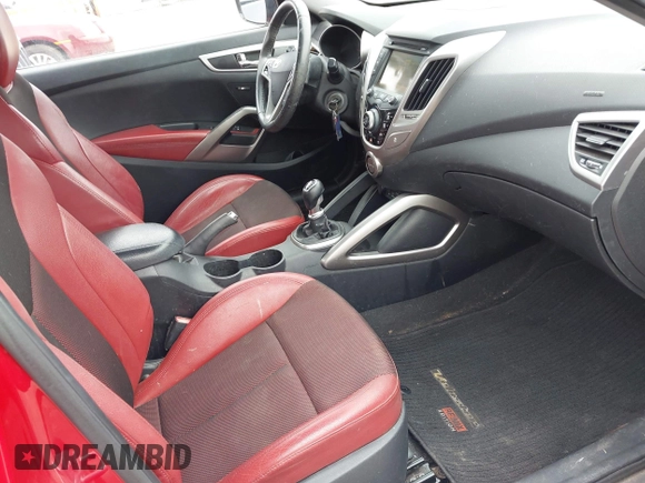 2013 Hyundai Veloster w/Gray Int z VIN KMHTC6AD8DU146035, wystawiony jako IAAI lot #41892703 z przebiegiem 241 169 mil mil oraz . Historia ofert i sprzedaży dostępna na DreamBid. Obrazek 5.
