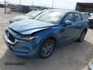 2018 Mazda CX-5 Sport with VIN JM3KFBBM8J0400741, listed as a IAAI auction lot 41860323 with 54,911 mi miles. Bid and sale history available at carsss.com. Image 2.