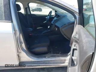 2018 Ford Focus SE with VIN 1FADP3F23JL315341, listed as a IAAI auction lot 41834939 with 121,686 mi miles. Bid and sale history available at carsss.com. Image 5.