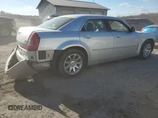 2006 Chrysler 300 C with VIN 2C3KA63H36H206819, listed as a Copart auction lot 46426165 with 64,937 mi miles and Salvage Title. Bid and sale history available at carsss.com. Image 3.