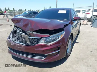 2018 Kia Optima LX with VIN 5XXGT4L3XJG248906, listed as a IAAI auction lot 42247354 with 112,905 mi miles and . Bid and sale history available at DreamBid. Image 2.