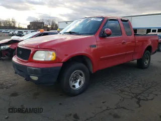 2000 Ford F-150 XL with VIN 1FTRX18W6YNC32005, listed as a Copart auction lot 82169314 with 289,320 mi miles and Salvage Title. Bid and sale history available at carsss.com. Image 1.
