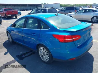 2015 Ford Focus Titanium with VIN 1FADP3J24FL322247, listed as a IAAI auction lot 41998030 with 151,341 mi miles and . Bid and sale history available at carsss.com. Image 3.