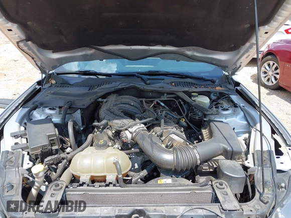 2016 Ford Mustang V6 z VIN 1FATP8EM7G5292011, wystawiony jako IAAI lot #42635923 z przebiegiem 85 719 mil mil oraz . Historia ofert i sprzedaży dostępna na DreamBid. Obrazek 10.