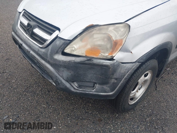2003 Honda CR-V LX with VIN JHLRD685X3C005548, listed as a IAAI auction lot 41955514 with 206,661 mi miles and . Bid and sale history available at DreamBid. Image 6.