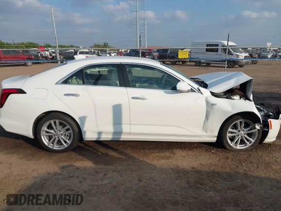 2024 Cadillac CT4 Luxury z VIN 1G6DA5RK2R0127414, wystawiony jako IAAI lot #41189546 z przebiegiem 6 383 mil mil oraz . Historia ofert i sprzedaży dostępna na DreamBid. Obrazek 13.