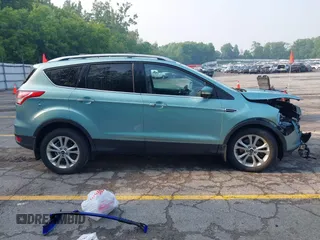 2013 Ford Escape Titanium with VIN 1FMCU9J99DUD63037, listed as a IAAI auction lot 42436605 with 168,200 mi miles and . Bid and sale history available at DreamBid. Image 13.