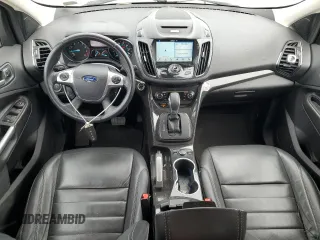 2016 Ford Escape Titanium with VIN 1FMCU9JX6GUB85980, listed as a Copart auction lot 51748715 with 129,537 mi miles and Salvage Title. Bid and sale history available at carsss.com. Image 8.
