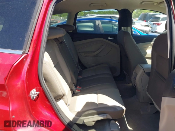 2016 Ford Escape SE with VIN 1FMCU9GX9GUC71209, listed as a IAAI auction lot 42037642 with 82,521 mi miles and . Bid and sale history available at DreamBid. Image 8.