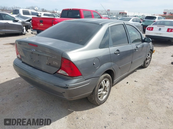 2004 Ford Focus ZTS with VIN 1FAFP38Z94W165483, listed as a IAAI auction lot 41775001 with 222,589 mi miles and . Bid and sale history available at carsss.com. Image 4.